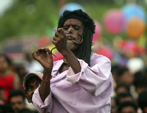 The Snake Taming Festival taming cobra